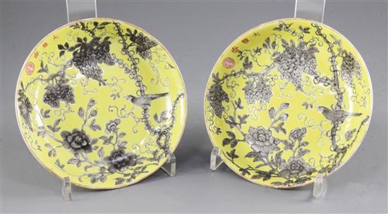 A pair of Chinese Empress Dowager Cixi grisaille decorated yellow ground saucer dishes, Da Ya Zhai marks, diameter 14.5cm